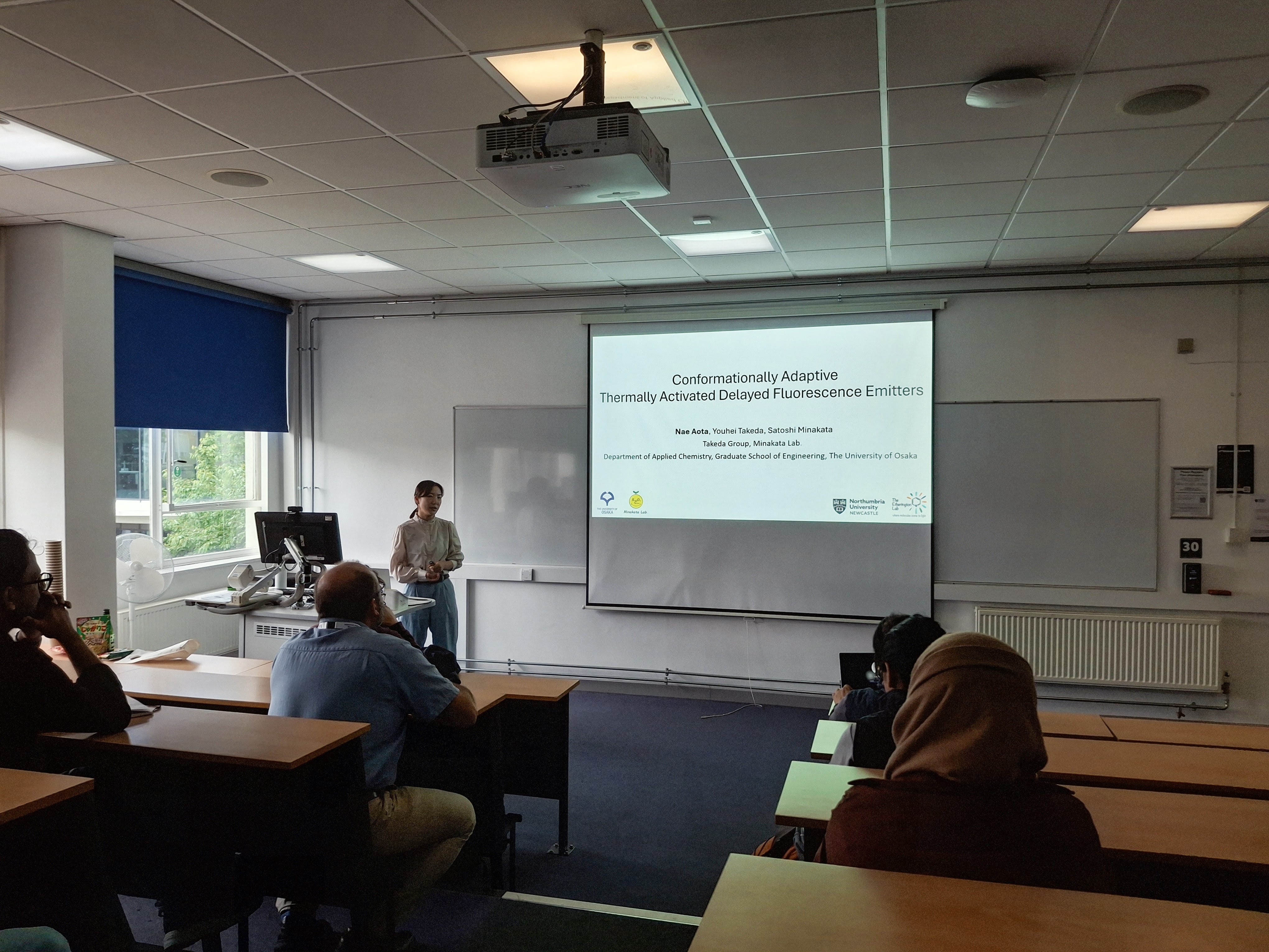 Nae presents a seminar to the NUPV Group